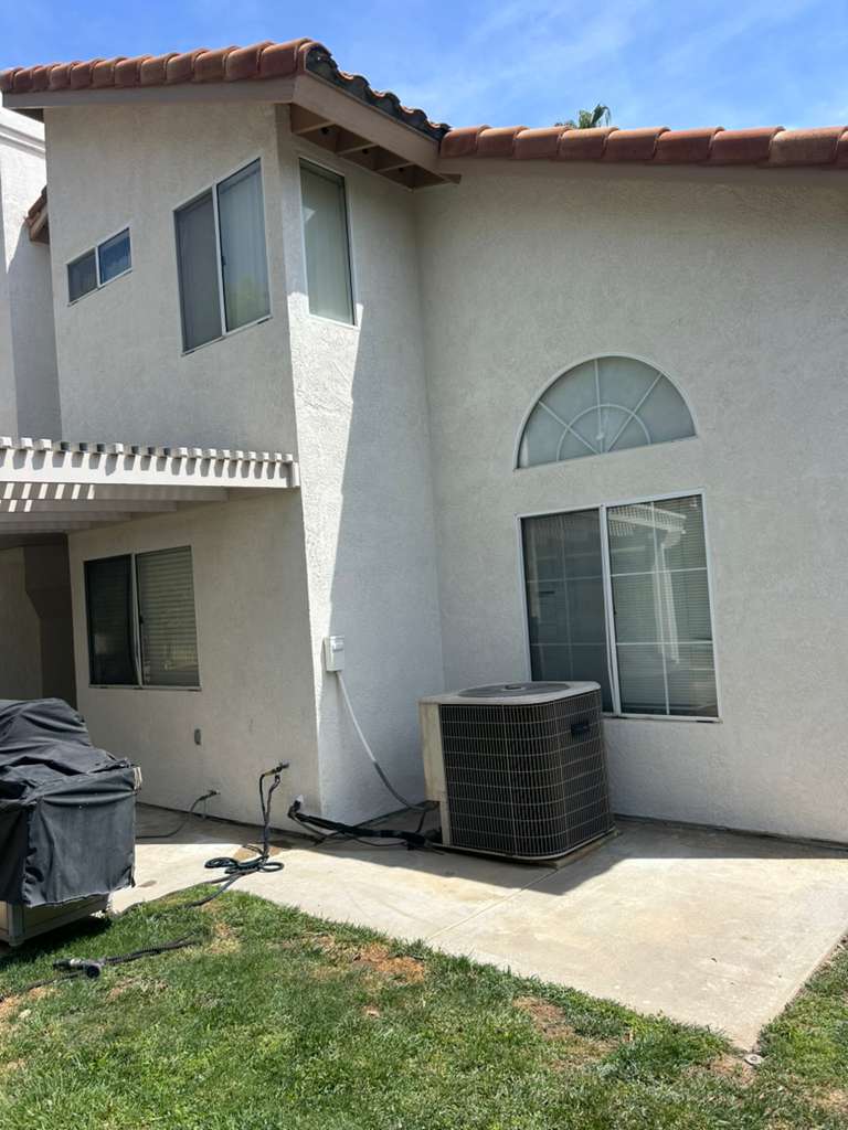 Recently completed exterior repaint, full rear elevation — Riverside, CA