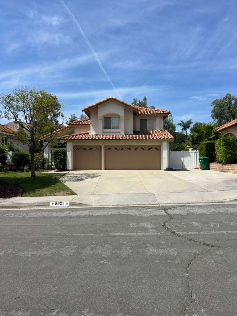 Full exterior repaint with clean stucco finish in Southern California