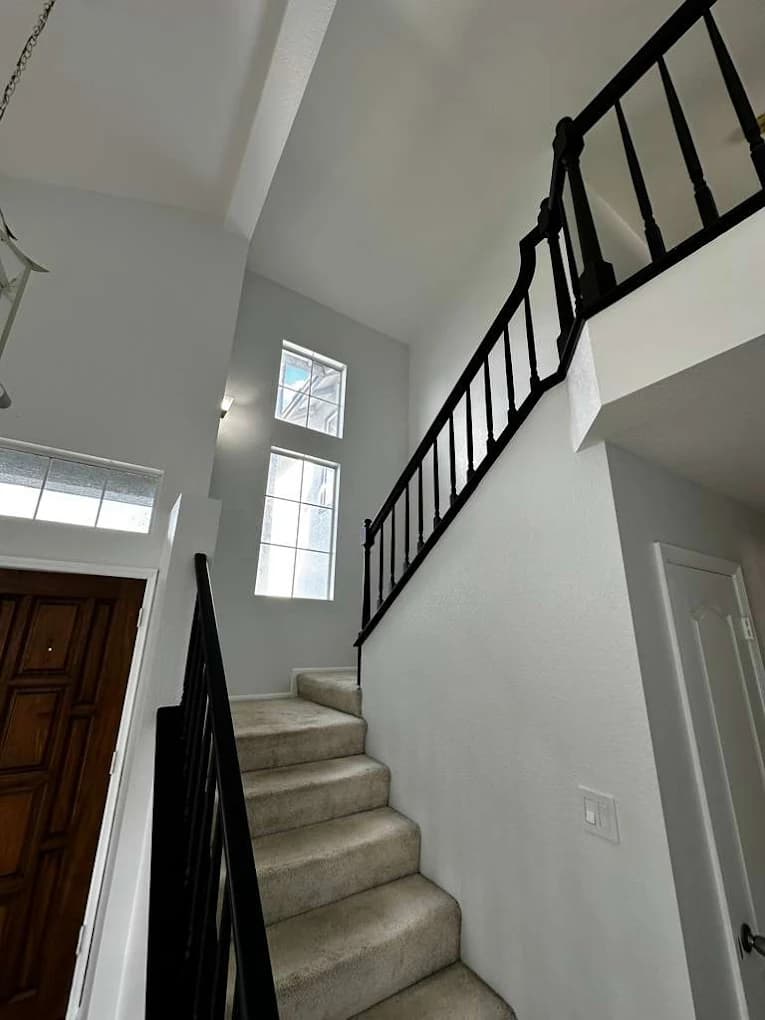 Interior living space with professionally painted walls by CM Painters